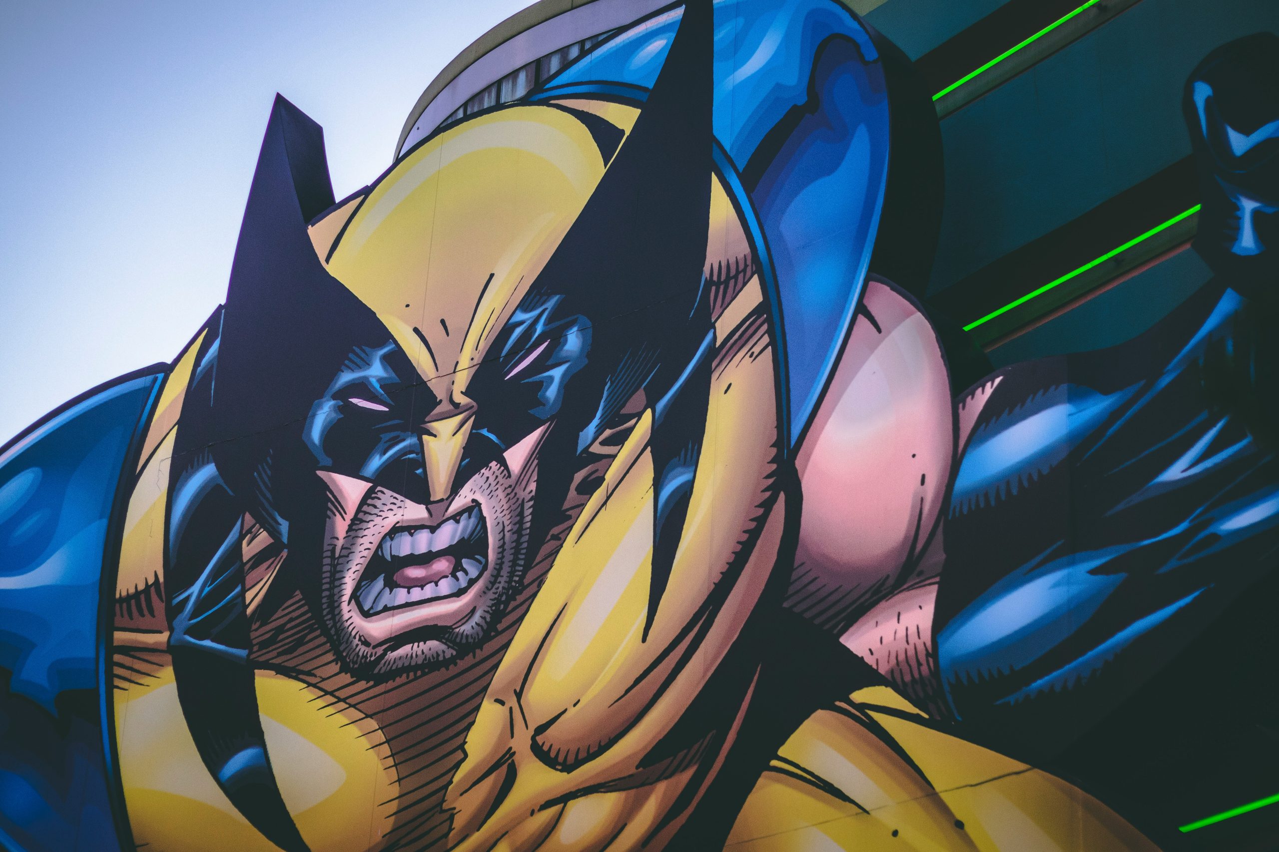 Close-up of fierce comic-style superhero resembling Wolverine in action pose