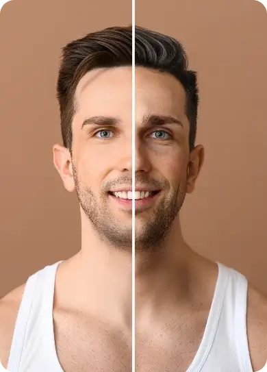 Smiling man with a split face, wearing a white tank top, against a brown background.